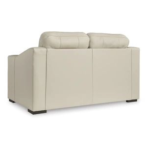 Ashley Furniture Treasure Trove Leather/Faux Leather Loveseat in Almond