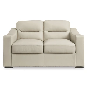 Ashley Furniture Treasure Trove Leather/Faux Leather Loveseat in Almond