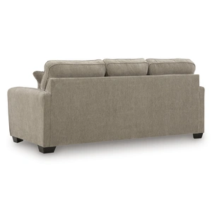 Ashley Furniture Olten Modern Sofa | Mocha Fabric with Accent Pillows in Mocha