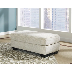 Ashley Furniture Monaghan 44-inch Rectangular Accent Ottoman - Sandstone Beige Textured Polyester, Sandstone